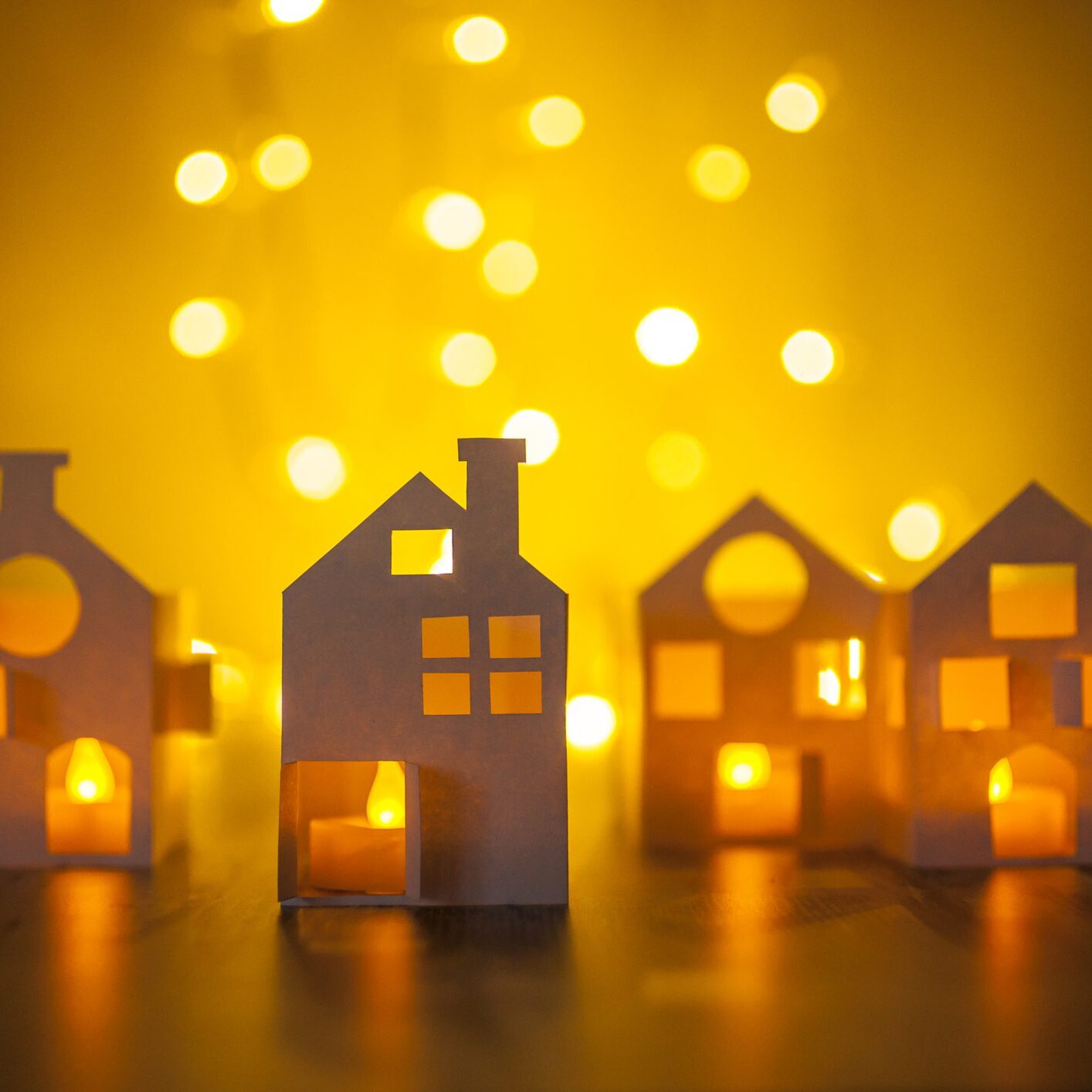Paper houses and bokeh background